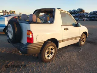 2000 Chevrolet Tracker z VIN 2CNBE18C3Y6920718, wystawiony jako IAAI lot #41566833 z przebiegiem 157 316 mil mil oraz . Historia ofert i sprzedaży dostępna na DreamBid. Obrazek 4.