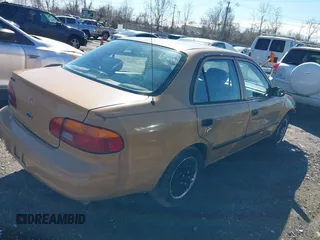 1999 Chevrolet Prizm z VIN 1Y1SK5284XZ400907, wystawiony jako IAAI lot #41821292 z przebiegiem 90 134 mil mil oraz . Historia ofert i sprzedaży dostępna na DreamBid. Obrazek 4.