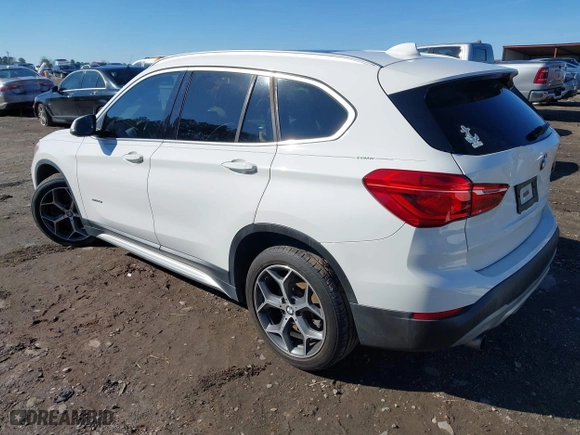 2017 BMW X1 xDrive28i with VIN WBXHT3C37H5F69725, listed as a IAAI auction lot 41588095 with 109,704 mi miles. Bid and sale history available at carsss.com. Image 3.