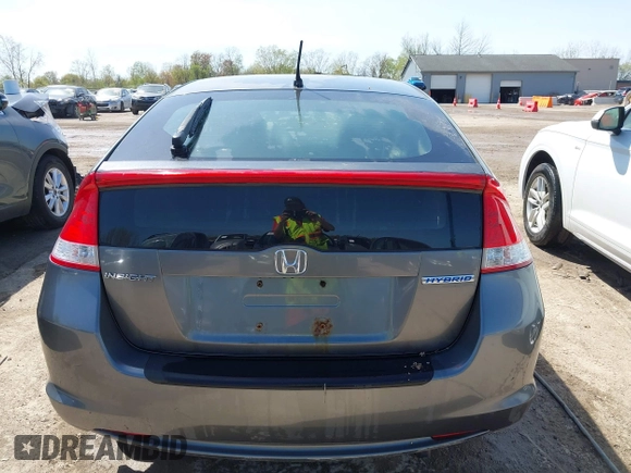 2010 Honda Insight EX with VIN JHMZE2H75AS008489, listed as a IAAI auction lot 42124780 with 226,100 mi miles and . Bid and sale history available at DreamBid. Image 17.