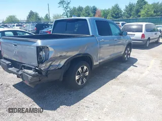 2020 Honda Ridgeline RTL with VIN 5FPYK3F5XLB019296, listed as a IAAI auction lot 42204290 with 48,197 mi miles and . Bid and sale history available at DreamBid. Image 4.