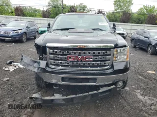 2012 GMC Sierra 2500HD SLE z VIN 1GT220CG3CZ241577, wystawiony jako Copart lot #58050175 z przebiegiem 166 821 mil mil oraz Szkoda całkowita • Salvage title. Historia ofert i sprzedaży dostępna na DreamBid. Obrazek 5.