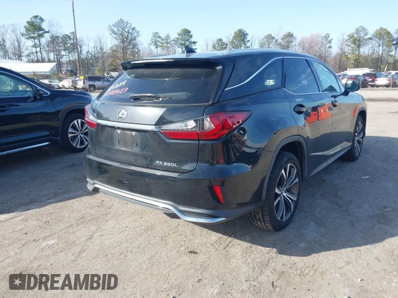2018 Lexus RX 350L Premium z VIN JTJDZKCA8J2005182, wystawiony jako IAAI lot #41740685 z przebiegiem 113 405 mil mil oraz . Historia ofert i sprzedaży dostępna na DreamBid. Obrazek 4.