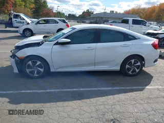 2019 Honda Civic Sedan LX with VIN 2HGFC2F66KH533012, listed as a IAAI auction lot 40608414 with 116,649 mi miles. Bid and sale history available at carsss.com. Image 15.