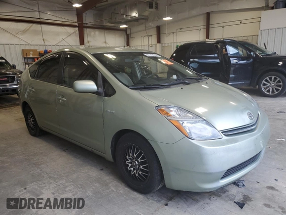 2007 Toyota Prius z VIN JTDKB20U577556730, wystawiony jako Copart lot #61117255 z przebiegiem Nie podano mil oraz Nie do naprawy • Non repairable. Historia ofert i sprzedaży dostępna na DreamBid. Obrazek 4.