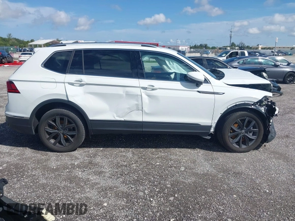 2024 Volkswagen Tiguan SE z VIN 3VV3B7AX3RM120298, wystawiony jako IAAI lot #41862454 z przebiegiem Nie podano mil oraz . Historia ofert i sprzedaży dostępna na DreamBid. Obrazek 13.