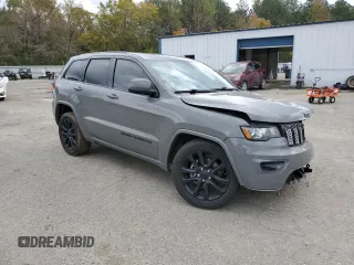 2020 Jeep Grand Cherokee Laredo E with VIN 1C4RJEAG0LC404979, listed as a Copart auction lot 81999474 with 57,328 mi miles and Salvage title. Bid and sale history available at DreamBid. Image 4.