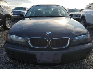 2005 BMW 3 Series 325i with VIN WBAET37455NJ90117, listed as a Copart auction lot 73879614 with 129,515 mi miles and Salvage Title. Bid and sale history available at carsss.com. Image 5.