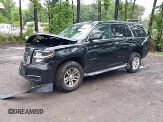 2015 Chevrolet Tahoe LT with VIN 1GNSCBKC9FR600997, listed as a IAAI auction lot 42383789 with 161,151 mi miles and . Bid and sale history available at DreamBid. Image 18.
