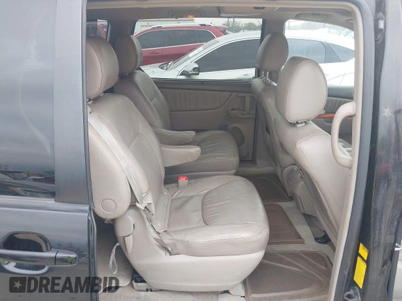 2009 Toyota Sienna XLE with VIN 5TDZK22C09S225520, listed as a IAAI auction lot 42126813 with 217,573 mi miles. Bid and sale history available at carsss.com. Image 8.