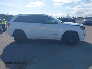 2017 Jeep Grand Cherokee 75th Anniversary with VIN 1C4RJEAG2HC823049, listed as a IAAI auction lot 41178561 with 117,157 mi miles and . Bid and sale history available at DreamBid. Image 1.