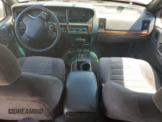 1997 Jeep Grand Cherokee Laredo with VIN 1J4GZ58S3VC770085, listed as a Copart auction lot 57584684 with 0 mi miles and Clean Title. Bid and sale history available at carsss.com. Image 8.