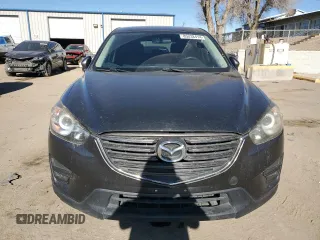 2016 Mazda CX-5 Sport with VIN JM3KE4BY3G0907976, listed as a Copart auction lot 85238414 with 92,933 mi miles and Salvage title. Bid and sale history available at DreamBid. Image 5.