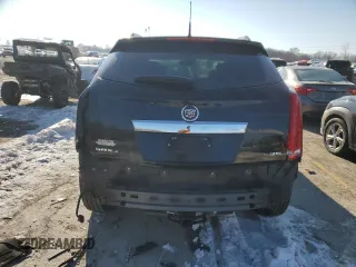 2014 Cadillac SRX Premium Collection z VIN 3GYFNGE38ES577313, wystawiony jako Copart lot #87679045 z przebiegiem 92 070 mil mil oraz Szkoda całkowita • Salvage title. Historia ofert i sprzedaży dostępna na DreamBid. Obrazek 6.