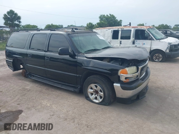 2003 GMC Yukon XL SLT z VIN 1GKEC16Z43J107189, wystawiony jako IAAI lot #42288816 z przebiegiem 312 532 mil mil oraz . Historia ofert i sprzedaży dostępna na DreamBid. Obrazek 1.