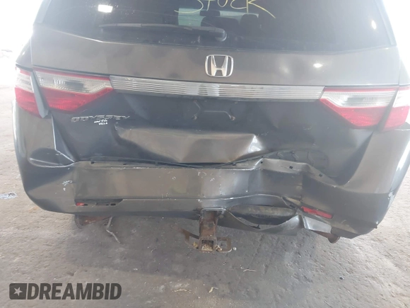 2012 Honda Odyssey EX-L with VIN 5FNRL5H67CB016934, listed as a IAAI auction lot 42405714 with 248,512 mi miles and . Bid and sale history available at DreamBid. Image 6.