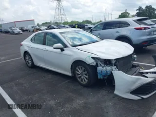 2019 Toyota Camry LE with VIN 4T1B11HK2KU743445, listed as a IAAI auction lot 42129688 with 284,938 mi miles and . Bid and sale history available at DreamBid. Image 1.