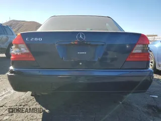 1996 Mercedes-Benz C with VIN WDBHA28E5TF406948, listed as a Copart auction lot 80234944 with 239,256 mi miles and Salvage Title. Bid and sale history available at carsss.com. Image 6.