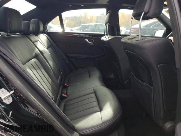 2016 Mercedes-Benz E-Class E 400 with VIN WDDHF6HB4GB188360, listed as a Copart auction lot 77592084 with 55,728 mi miles and Salvage Title. Bid and sale history available at carsss.com. Image 10.
