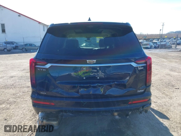 2021 Cadillac XT6 Premium Luxury z VIN 1GYKPDRS8MZ175544, wystawiony jako IAAI lot #41591775 z przebiegiem 39 290 mil mil oraz . Historia ofert i sprzedaży dostępna na DreamBid. Obrazek 16.