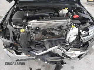 2022 Ram 1500 Laramie with VIN 1C6SRFJT4NN300006, listed as a Copart auction lot 54976775 with 61,436 mi miles and Salvage title. Bid and sale history available at DreamBid. Image 11.