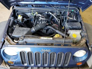 2009 Jeep Wrangler Unlimited X with VIN 1J4GZ39159L713502, listed as a Copart auction lot 79553984 with 186,862 mi miles and Clean Title. Bid and sale history available at carsss.com. Image 12.