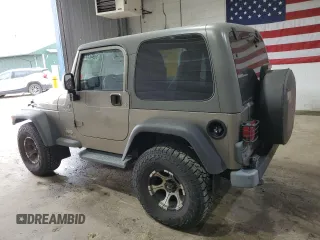 2005 Jeep Wrangler Sport z VIN 1J4FA49S75P325028, wystawiony jako Copart lot #56942315 z przebiegiem 169 988 mil mil oraz Szkoda całkowita • Salvage title. Historia ofert i sprzedaży dostępna na DreamBid. Obrazek 2.