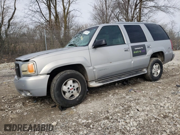 1999 GMC Denali with VIN 1GKEK13R0XR915053, listed as a Copart auction lot 49241145 with 2,664,121 mi miles and Salvage Title. Bid and sale history available at carsss.com. Image 1.