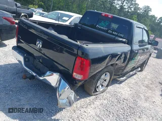 2013 Ram 1500 SLT z VIN 1C6RR6LG8DS545809, wystawiony jako IAAI lot #42013194 z przebiegiem 154 603 mil mil oraz . Historia ofert i sprzedaży dostępna na DreamBid. Obrazek 4.