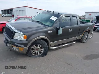 2005 Ford F-150 XLT with VIN 1FTPX14515NA43732, listed as a IAAI auction lot 41901453 with 216,729 mi miles. Bid and sale history available at carsss.com. Image 2.