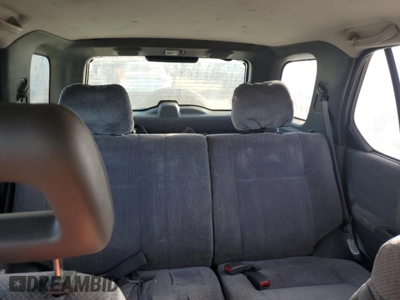 1999 Isuzu Rodeo S with VIN 4S2CK58W1X4349947, listed as a Copart auction lot 84634064 with 135,851 mi miles and Clean Title. Bid and sale history available at DreamBid. Image 10.