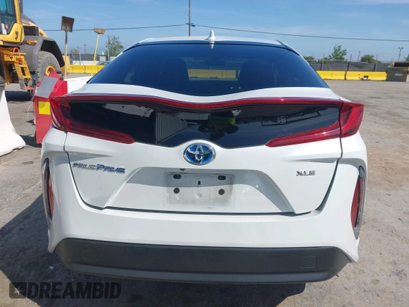 2021 Toyota Prius LE with VIN JTDKAMFP2M3177459, listed as a IAAI auction lot 42093828 with 65,501 mi miles and . Bid and sale history available at DreamBid. Image 16.
