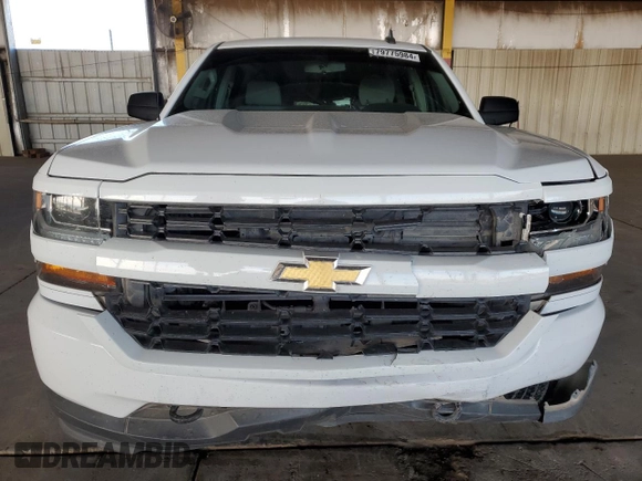 2018 Chevrolet Silverado 1500 Custom with VIN 3GCPCPEH4JG383662, listed as a Copart auction lot 79775984 with 147,850 mi miles and Salvage Title. Bid and sale history available at DreamBid. Image 5.