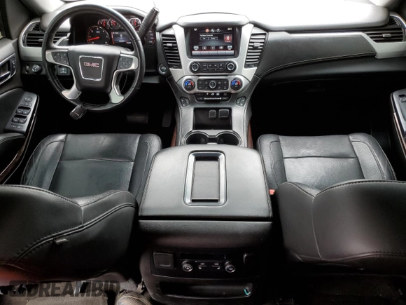 2015 GMC Yukon SLT z VIN 1GKS2BKCXFR269881, wystawiony jako Copart lot #57678175 z przebiegiem 256 703 mil mil oraz Czysty tytuł • Clean title. Historia ofert i sprzedaży dostępna na DreamBid. Obrazek 8.