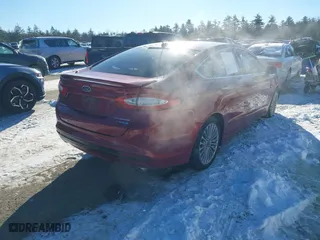 2014 Ford Fusion Titanium Hybrid with VIN 3FA6P0RUXER289087, listed as a IAAI auction lot 41418491 with 126,849 mi miles. Bid and sale history available at carsss.com. Image 4.