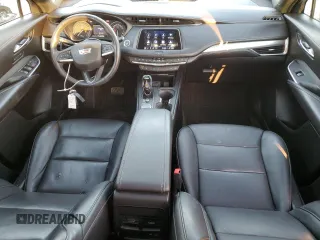 2022 Cadillac XT4 AWD Premium Luxury with VIN 1GYFZDR45NF109999, listed as a Copart auction lot 84618914 with 66,697 mi miles and Clean title. Bid and sale history available at DreamBid. Image 8.