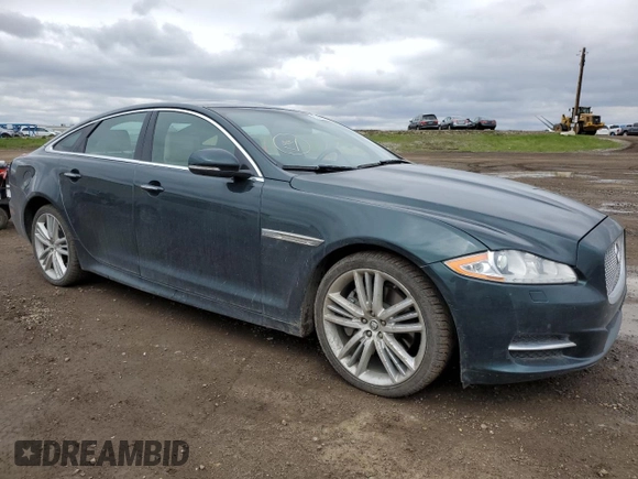 2015 Jaguar XJ Premium Luxury with VIN SAJXJ1CD3F8V88780, listed as a Copart auction lot 57488345 with 62,776 mi miles and Clean Title. Bid and sale history available at DreamBid. Image 4.
