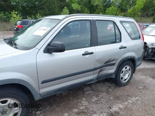 2006 Honda CR-V LX with VIN JHLRD78596C035974, listed as a IAAI auction lot 42119043 with 259,936 mi miles and . Bid and sale history available at carsss.com. Image 6.