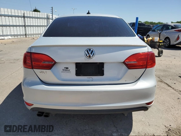 2012 Volkswagen Jetta PZEV with VIN 3VW4A7AJXCM123009, listed as a Copart auction lot 63573145 with 242,860 mi miles and Clean title. Bid and sale history available at DreamBid. Image 6.