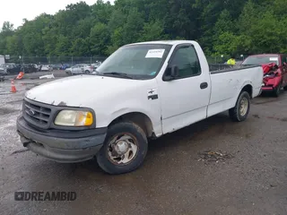 2003 Ford F-150 XL with VIN 1FTRF17203NA84217, listed as a IAAI auction lot 42324582 with 96,949 mi miles and . Bid and sale history available at DreamBid. Image 2.