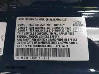 2021 Honda Pilot Elite with VIN 5FNYF6H04MB043014, listed as a IAAI auction lot 41826931 with 63,546 mi miles and . Bid and sale history available at DreamBid. Image 9.