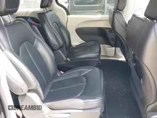 2023 Chrysler Pacifica Hybrid Touring L with VIN 2C4RC1L75PR592251, listed as a IAAI auction lot 42037873 with 44,428 mi miles and . Bid and sale history available at DreamBid. Image 8.
