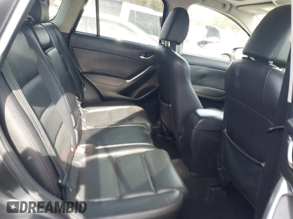 2016 Mazda CX-5 Grand Touring z VIN JM3KE4DY5G0836891, wystawiony jako IAAI lot #41441065 z przebiegiem 120 808 mil mil oraz . Historia ofert i sprzedaży dostępna na DreamBid. Obrazek 8.