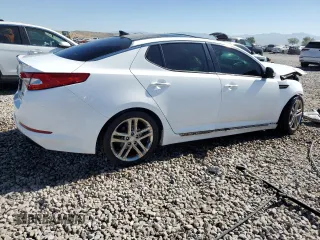 2013 Kia Optima SX with VIN 5XXGR4A60DG213906, listed as a Copart auction lot 60121165 with 121,559 mi miles and Salvage title. Bid and sale history available at DreamBid. Image 3.