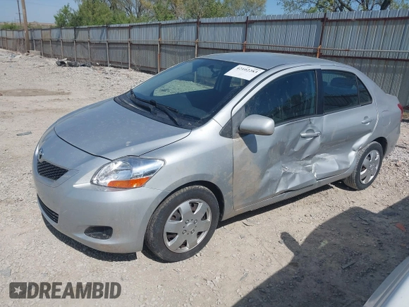 2009 Toyota Yaris with VIN JTDBT903X91301963, listed as a IAAI auction lot 42102283 with 143,966 mi miles. Bid and sale history available at carsss.com. Image 2.