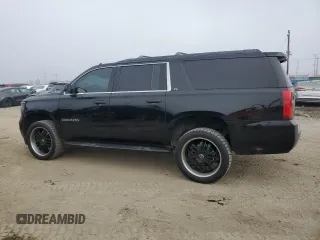 2015 Chevrolet Suburban LS z VIN 1GNSCHKC5FR250108, wystawiony jako Copart lot #47133585 z przebiegiem 188 099 mil mil oraz Czysty tytuł • Clean title. Historia ofert i sprzedaży dostępna na DreamBid. Obrazek 2.