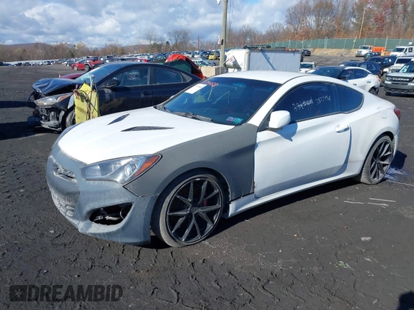 2013 Hyundai Genesis Coupe Grand Touring with VIN KMHHU6KJ7DU096543, listed as a IAAI auction lot 33714958 with 129,768 mi miles and . Bid and sale history available at DreamBid. Image 2.