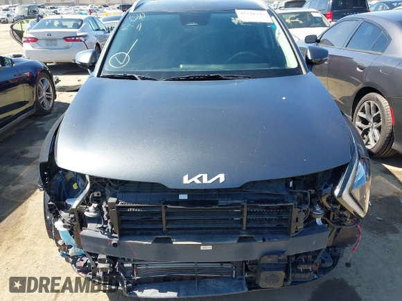 2023 Kia Sportage EX with VIN KNDPVCAG8P7019572, listed as a IAAI auction lot 42226335 with 68,583 mi miles and . Bid and sale history available at DreamBid. Image 13.