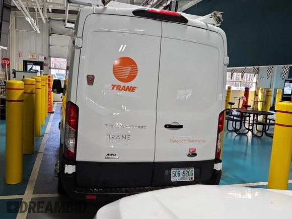 2021 Ford Transit Cargo with VIN 1FTBR2CG0MKB03044, listed as a IAAI auction lot 42232122 with 100,199 mi miles and . Bid and sale history available at DreamBid. Image 1.