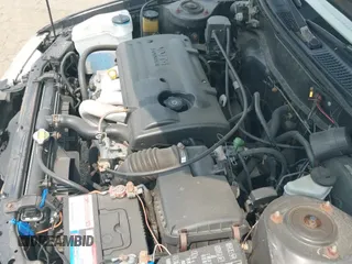 2000 Toyota Corolla VE z VIN 2T1BR18E2YC293406, wystawiony jako IAAI lot #42858144 z przebiegiem 257 657 mil mil oraz . Historia ofert i sprzedaży dostępna na DreamBid. Obrazek 12.